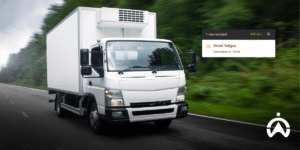 Logistics trucks on toll roads with drowsiness detection notifications on GPS tracker systems to increase vehicle fleet ROI.