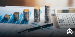 A stack of coins on top of a financial chart shows MiFleet helping fleet businesses recover from the crisis.
