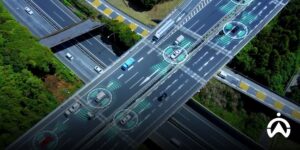 Aerial view of highway with digital signals of autonomous vehicle technology