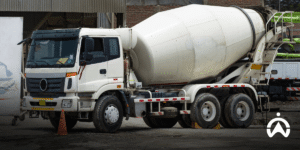 Cement mixer trucks in the project area as an implementation of the GPS tracker feature for construction companies in monitoring heavy equipment activities.