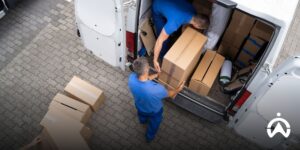 The expedition officer puts the package into a delivery car equipped with a GPS tracker to make it easier for customers to track the delivery.