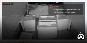 Open cargo monitoring footage on a trailer truck with security system notifications from a telematics device.