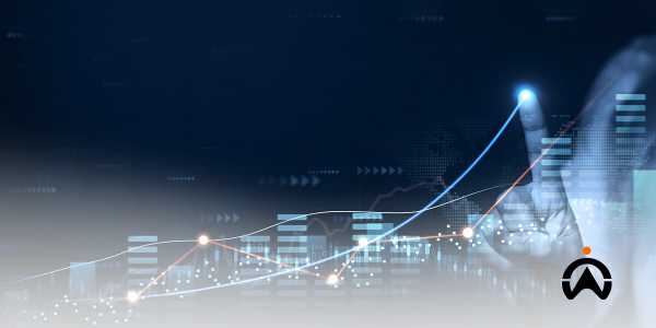 A_hand_touches_a_digital_graph_rising_over_the_cityscape_showing_the_growth_of_efficiency_and_IoTs_impact_on_fleet_management.