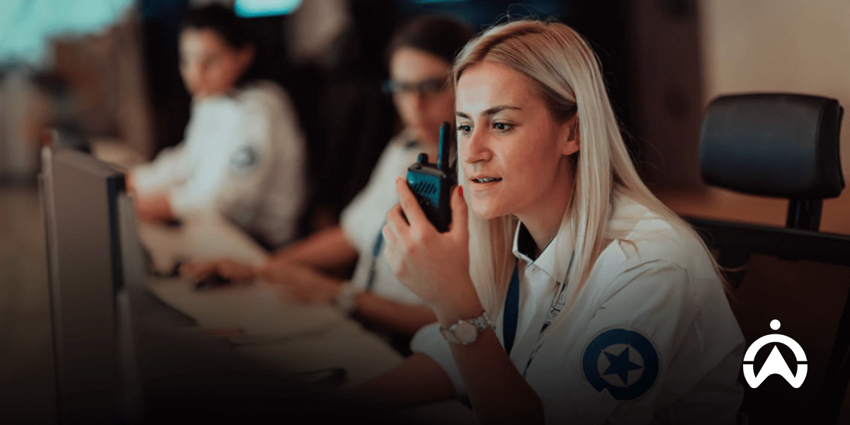 Medical officers operate the ambulance fleet management system via telephone to coordinate emergency services.