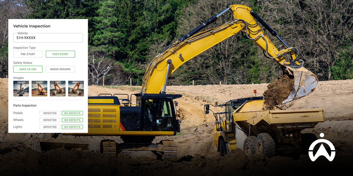 Ekskavator kuning memuat tanah ke truk di area konstruksi, dilengkapi sistem GPS excavator untuk pemantauan kinerja efisien.